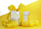 Yellow theme gift box with yellow polka dot ribbon 