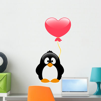 Penguin with Balloon Wall Decal shown on a wall