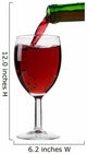 pouring red wine from the bottle into a glass 