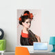 The young Japanese woman on a grey background Wall Mural