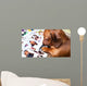 Cute dog among the photos Wall Mural
