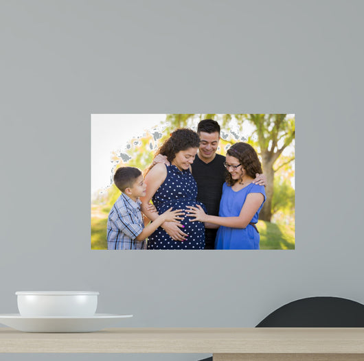 Hispanic Family Hands on Pregnant Mother Tummy Feeling Baby Kick 