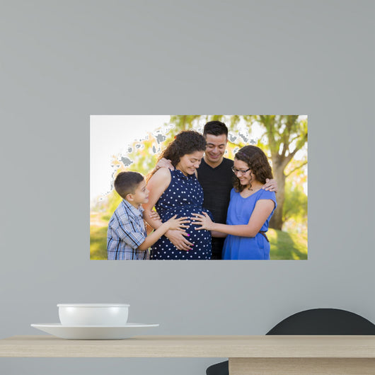 Hispanic Family Hands on Pregnant Mother Tummy Feeling Baby Kick 