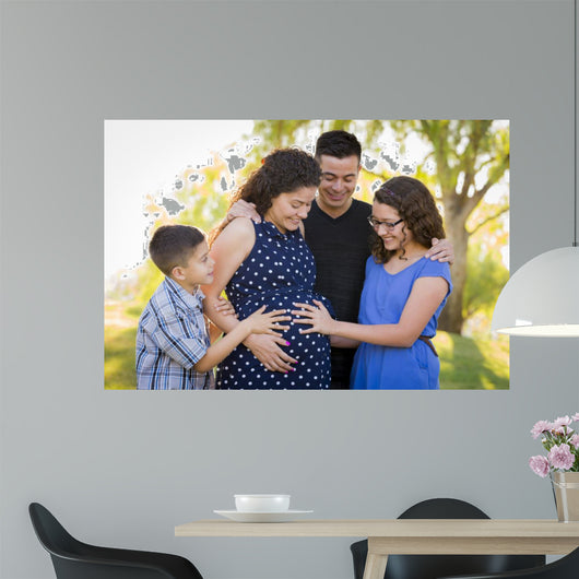Hispanic Family Hands on Pregnant Mother Tummy Feeling Baby Kick 