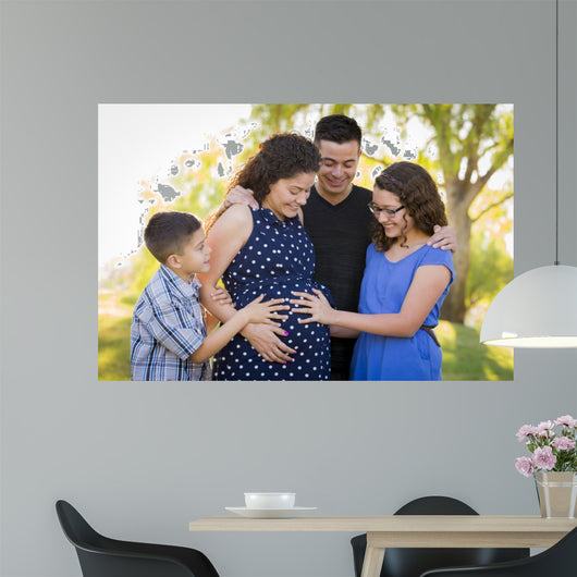 Hispanic Family Hands on Pregnant Mother Tummy Feeling Baby Kick 