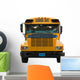 Front view of yellow school bus isolated Wall Decal