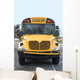 A view of the front of a school bus. Wall Mural
