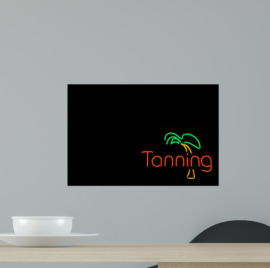 Colorful Neon Sign Advertising a Tanning Booth 