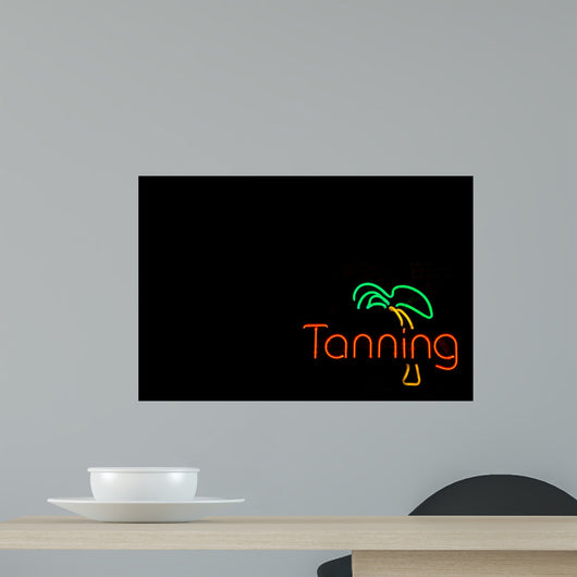 Colorful Neon Sign Advertising a Tanning Booth 