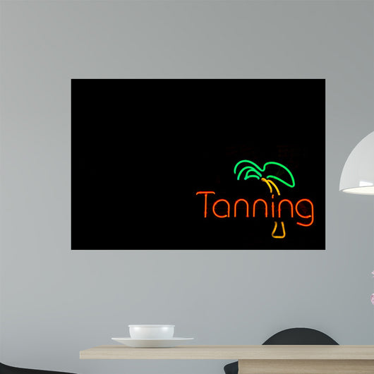 Colorful Neon Sign Advertising a Tanning Booth 