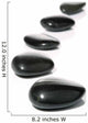 Five black pebbles in a gentle curve on a white surface Wall Mural