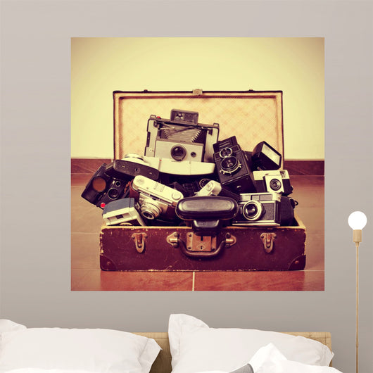 old cameras in an old suitcase 