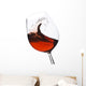 Isolated moving (motion blur) red wine glass Wall Decal
