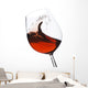 Isolated moving (motion blur) red wine glass Wall Decal