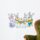 Easter bunnies at the festive table Wall Decal
