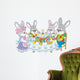 Easter bunnies at the festive table Wall Decal