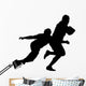 Side Profile of Rugby Player Tackling Runner With Ball Wall Decal