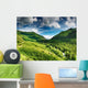 Mountain landscape with forest and blue sky Wall Mural