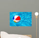 Beach ball in swimming pool Wall Mural