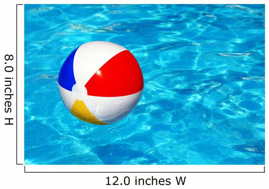 Beach ball in swimming pool Wall Mural