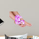 Pedicure with pink orchid flowers isolated Wall Decal