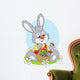 Easter Bunny with a basket of painted eggs Wall Decal