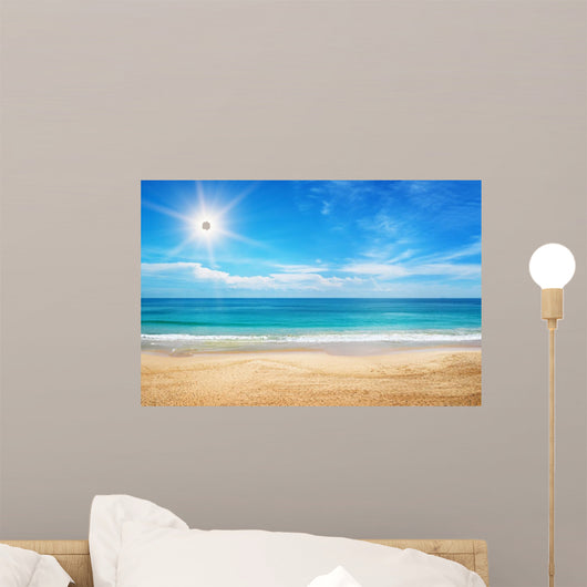 seascape and sun on blue sky background 