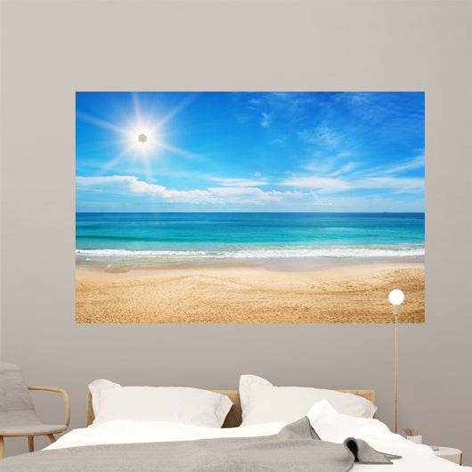 seascape and sun on blue sky background 