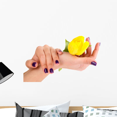 Beautiful Woman Hands with shown on a wall