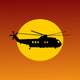 Helicopter Flying Passing Sun at Sunset Wall Mural