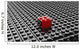Black lego background with one red block standing out 