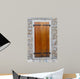 Large wooden shutters in a stone wall 