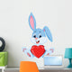 Cute rabbit holding red hat Wall Decal