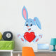 Cute rabbit holding red hat Wall Decal