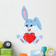 Cute rabbit holding red hat Wall Decal