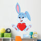 Cute rabbit holding red hat Wall Decal