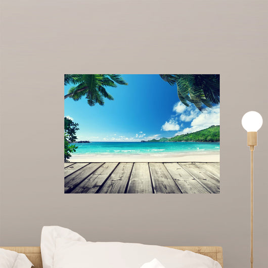 seychelles beach and wooden pier 