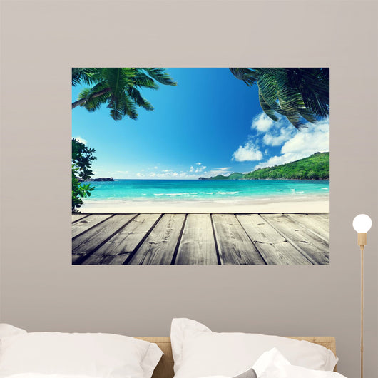 seychelles beach and wooden pier 