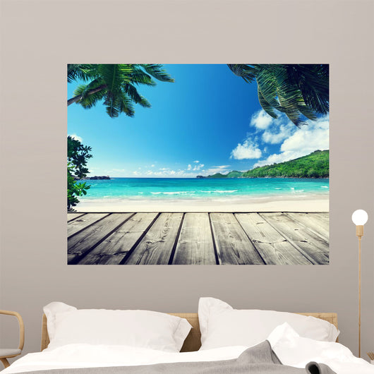 seychelles beach and wooden pier 