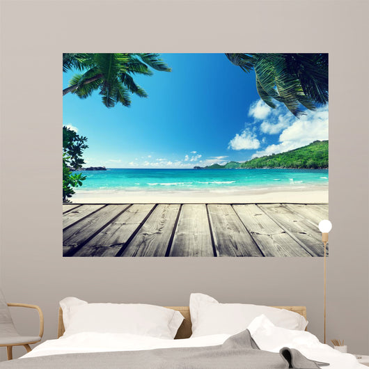 seychelles beach and wooden pier 