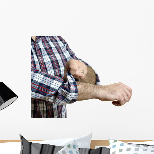 Man rolls up sleeves Wall Decal