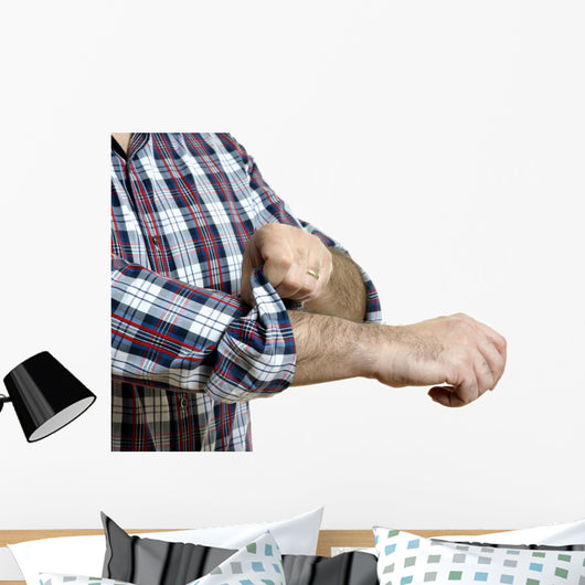 Man rolls up sleeves Wall Decal