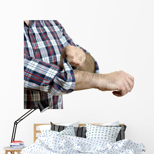 Man rolls up sleeves Wall Decal