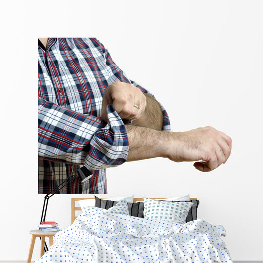 Man rolls up sleeves Wall Decal