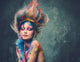 Young woman muse with creative body art and hairdo 