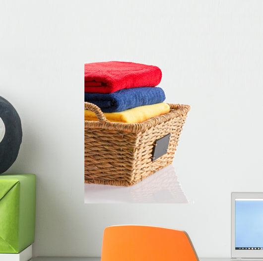 Fresh Clean Towels in a Wicker Basket 