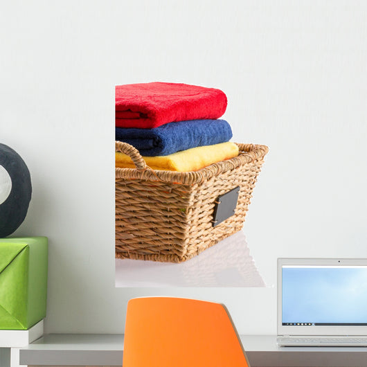 Fresh Clean Towels in a Wicker Basket 