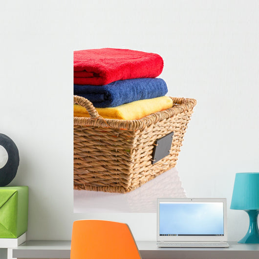 Fresh Clean Towels in a Wicker Basket 
