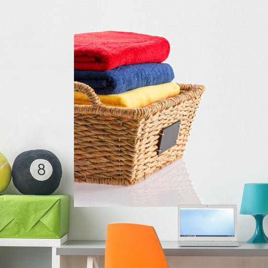 Fresh Clean Towels in a Wicker Basket 