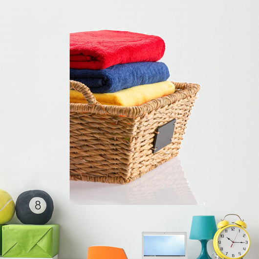 Fresh Clean Towels in a Wicker Basket 